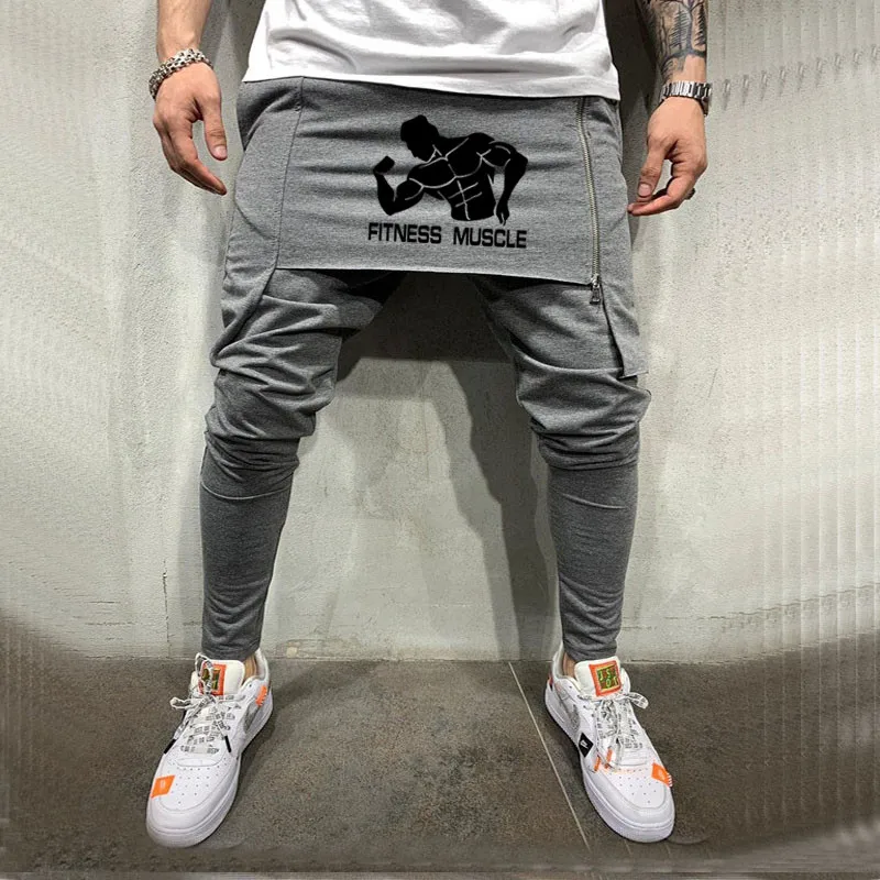 

2021 Men Running Pants Fitness Muscle Big Logo Culottes Individual Design Pencil Pants Jogger Fitness Bodybuilding Sweatpants