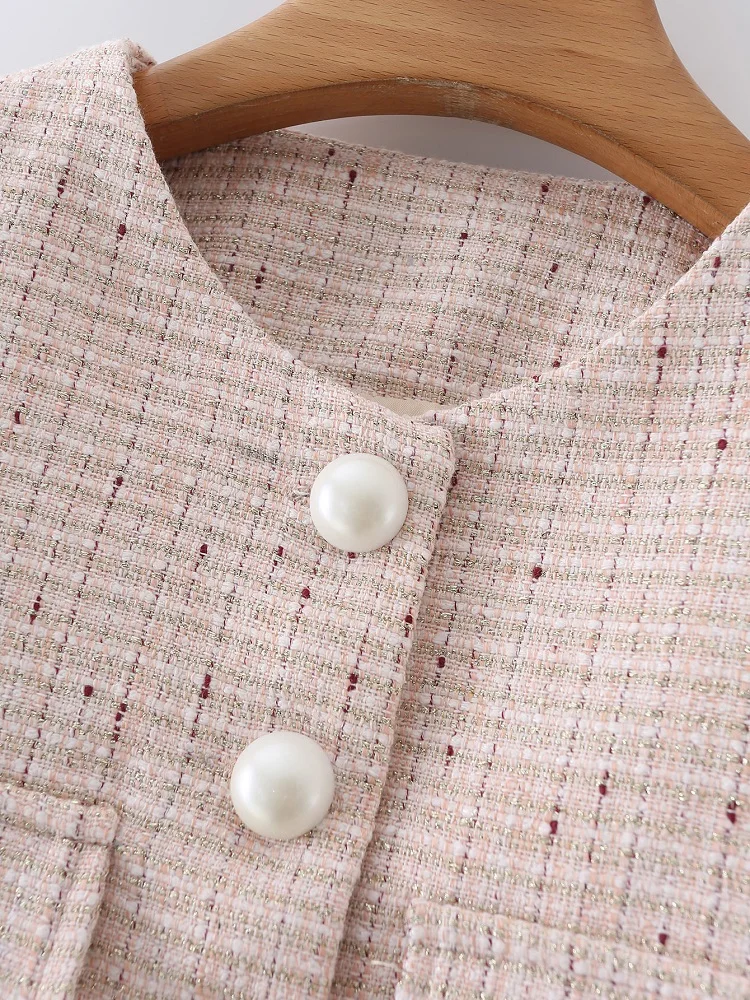 KEYANKETIAN 2021 spring and autumn new women's long-sleeved round neck pocket with pearl buckle woolen woven short suit jacket