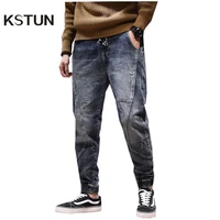 kstun joggers jean men motorcycle jeans streetwear drawstring elastic waist ruched pants leisure riding jeans male plus size 42