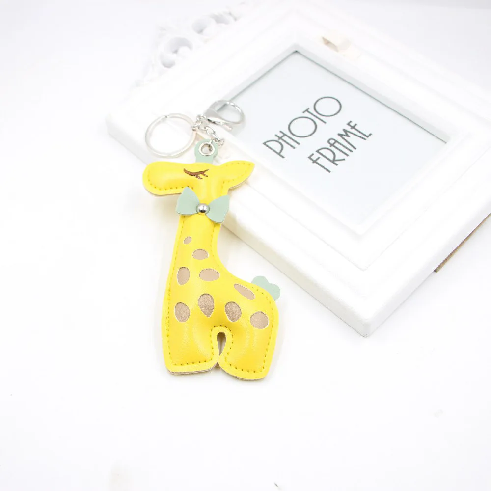 Personality Creative Giraffe Keychain, Chinese Bowknot Leather Bib, Giraffe Ornament, Ladies Handbag, Mobile Phone Car Pendant