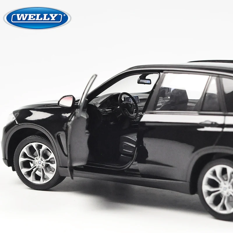 Модель автомобиля Welly 1:24 Porsche Macan Turbo из черного сплава литой и игрушечный