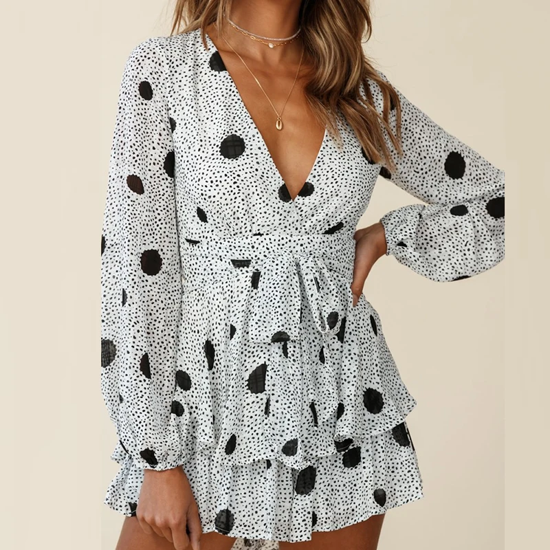 Женский мини-комбинезон с цветочным принтом глубоким V-образным вырезом |