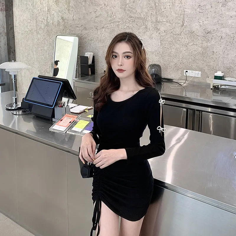 

Sexy black dress female rhinestone bow hollow 2021 spring women's new drawstring bag hip skirt