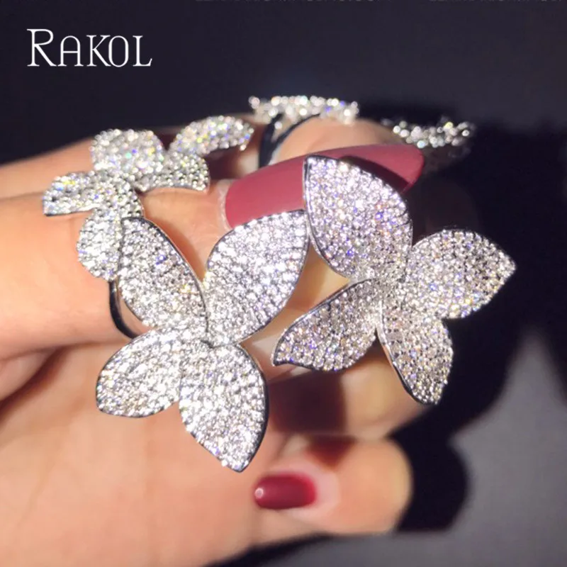 

RAKOL Top Quality Butterfly Jewelry Micro Paved Shiny Crystal Stud Earrings for Women Girls Fashion Unique Best Gifts RE20782K