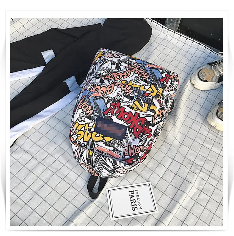 New backpack female cartoon alphabet doodle personality wild backpack men and women shoulder bag mochila