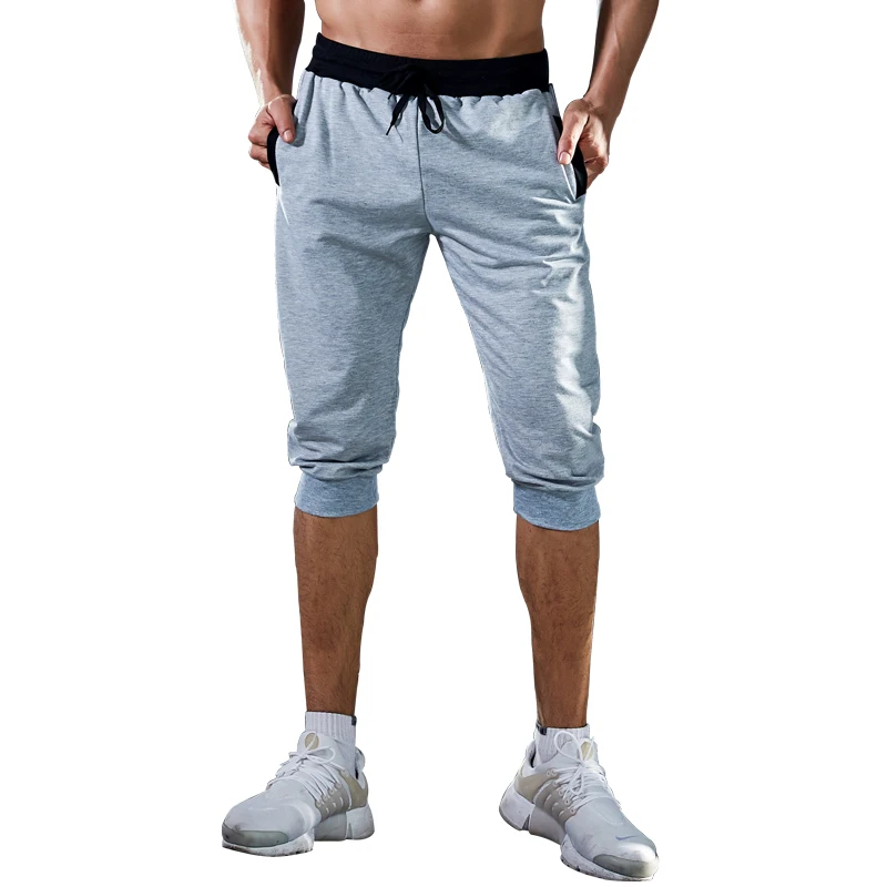 

New elastic belt waist men's shorts solid color Capris running jogging outdoor fitness pants cotton band pants