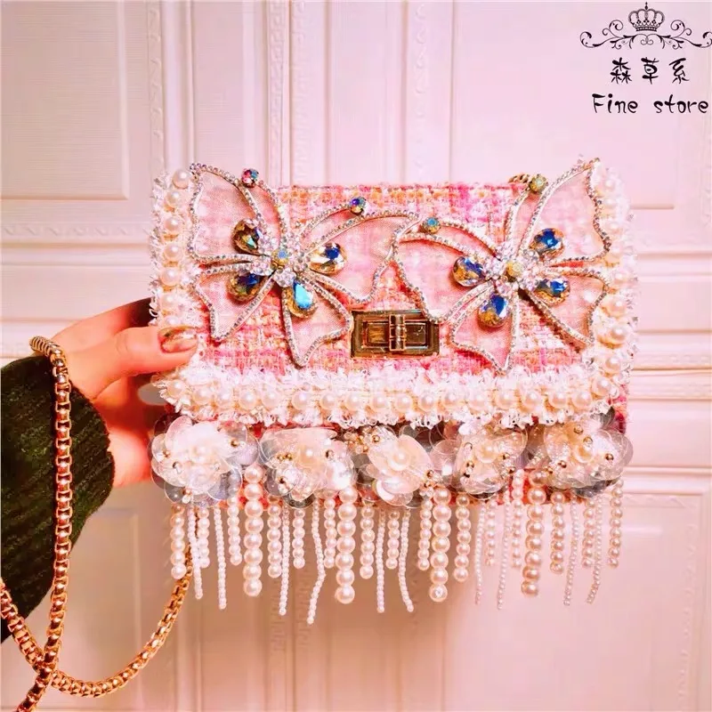 

In 2020, Chinese brand high quality fashionable diamond inlaid new style women's straddle handbag, free delivery