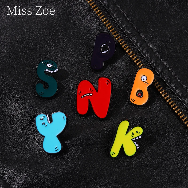 

Funny 26 Colorful Letters Enamel Pin Human Organs Exaggerate Teeth And Eyeballs Interesting Custom Brooches Lapel Pin Badge Gift