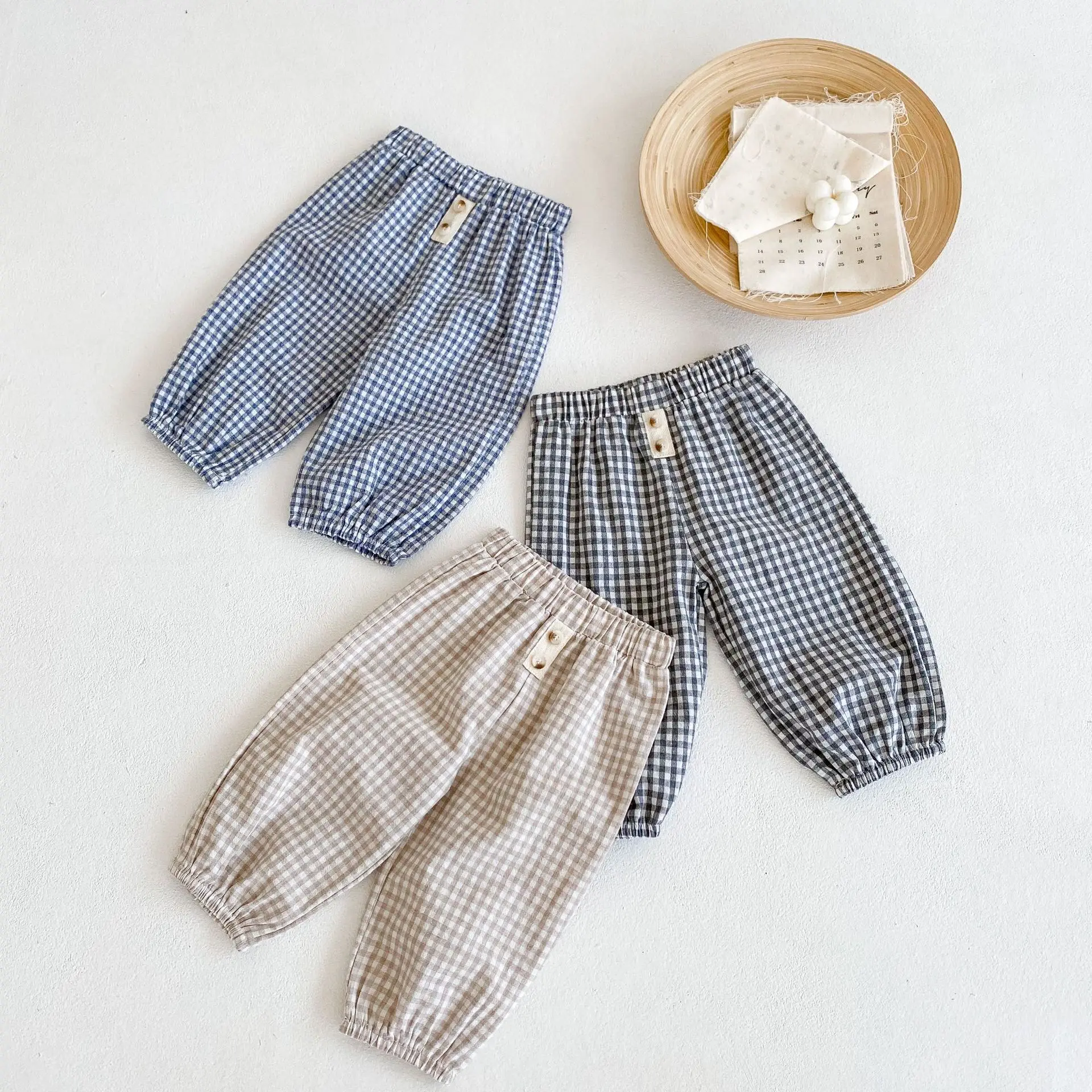 

ins2021 spring and autumn clothes new baby children's male and female baby plaid trousers wild loose fashion pants
