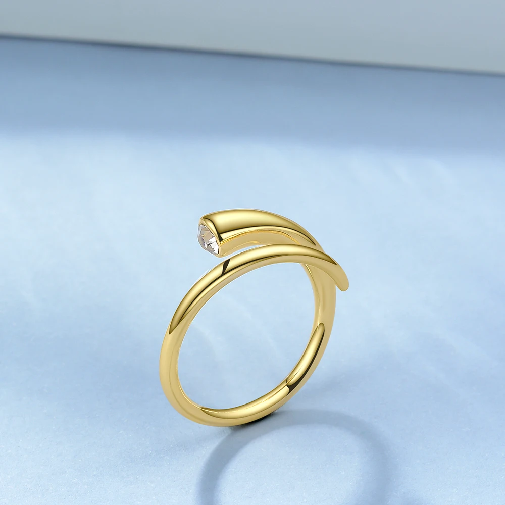 Женское золотистое кольцо в форме обмотки с кристаллом|Кольца| |