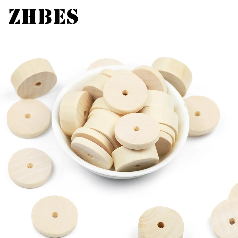 Бусины из натурального дерева диаметром 24 мм