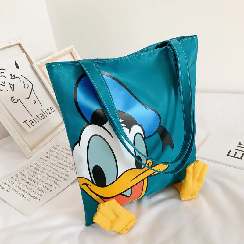 

Disney cartoon large capacity fashion female student shoulder bag Donald Duck shopping bag new portable bag for women
