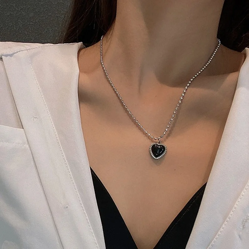 

U-Magical Statement Black Titanium Steel Love Heart Pendant Necklace for Women Round Beads Metallic Chain Necklace Jewellery