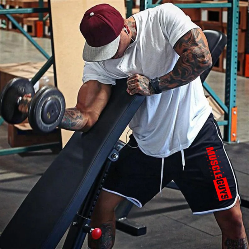 Muscleguys шорты для спортзала мужские с сеткой Короткие брюки повседневные шорты для бега спортивные брюки для фитнеса мужские спортивные шорты
