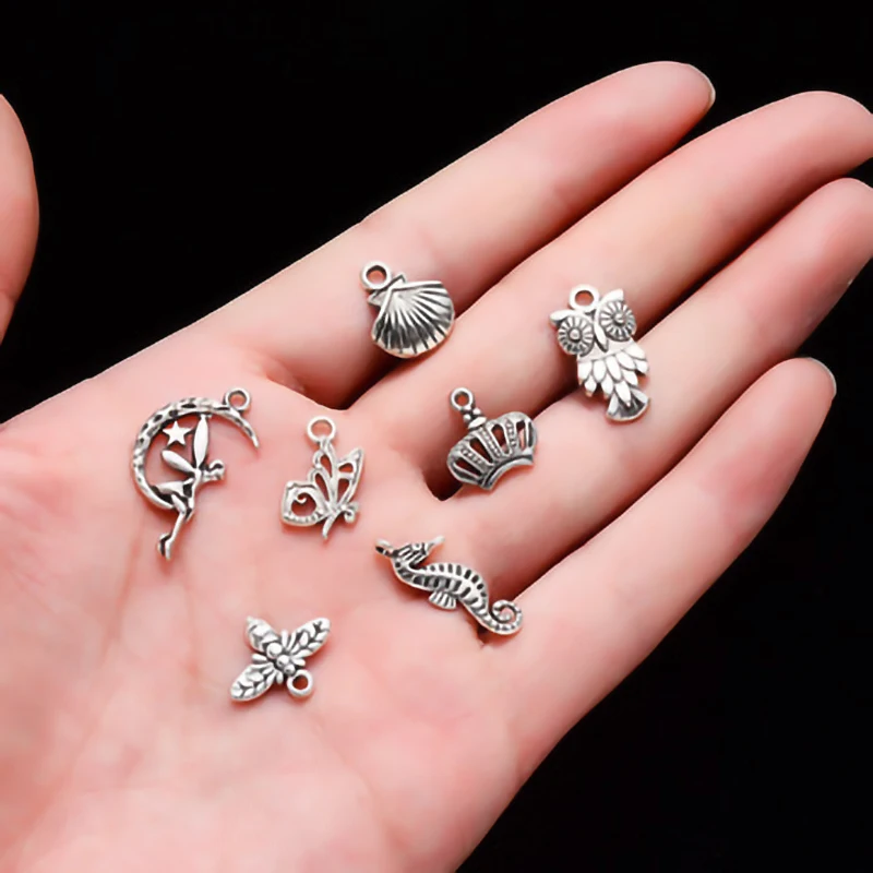 

1 Pack of 100 Holiday Decoration Pendants, Small Alloy Pendant Jewelry Accessories, Suitable for Holiday Decoration Characters