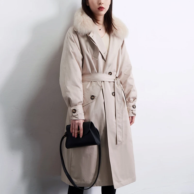 Женский пуховик с ремнем утепленный натуральным лисьим мехом длинное пуховое