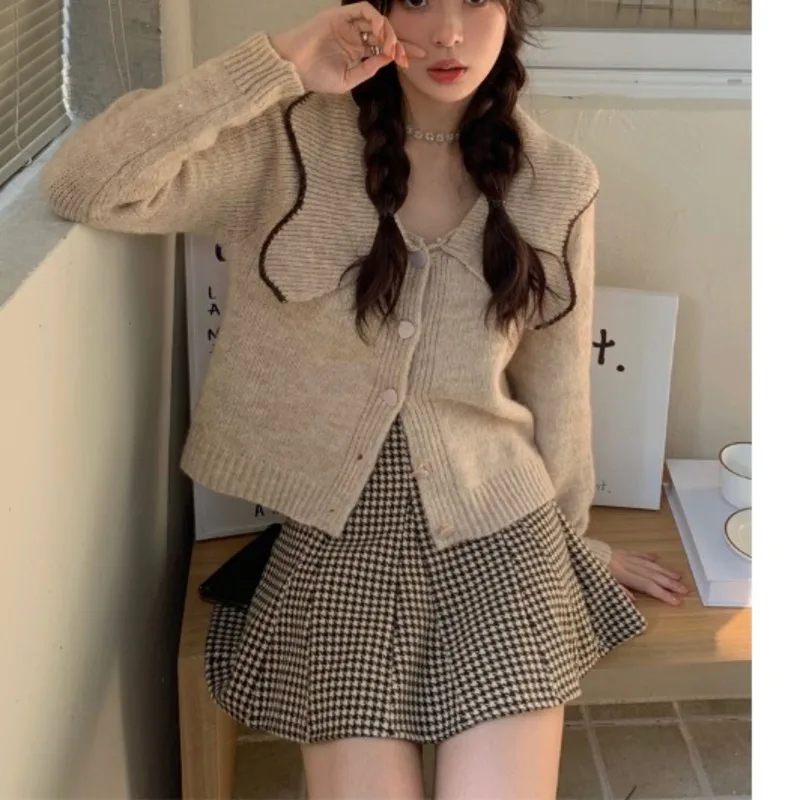 

Design Baby Collar Sweater Autumn Winter Salt Suit Plaid Pleated Skirt Two Piece Set Women Rac