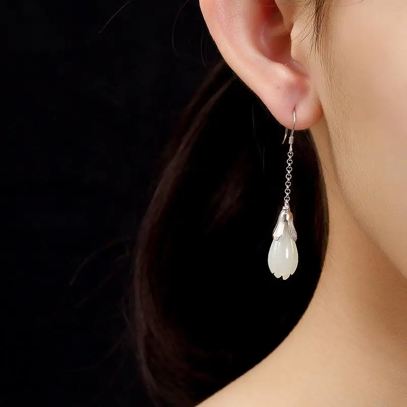 

Designer's unique creative silver inlaid natural Hetian magnolia long earrings temperament personality ladies jewelry