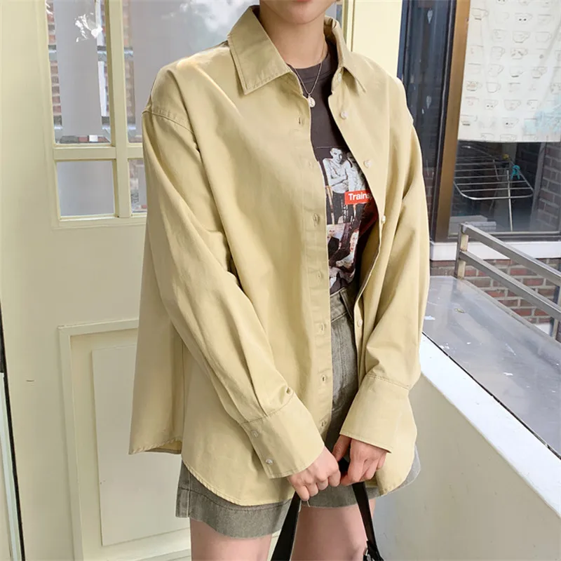 

RUGOD 2021 spring solid color all-match belt shirt