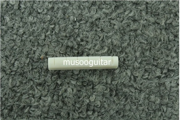 

2 pcs Brand new White slotted Bone guitar nut made for (43x6x9)