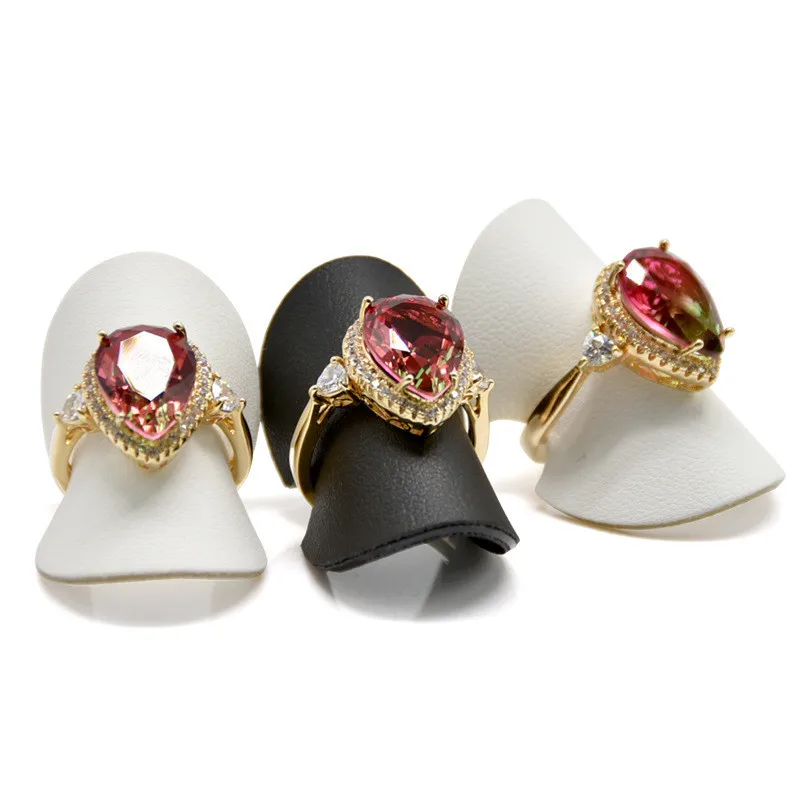 

Новинка, держатель колец из искусственной кожи, черный, белый органайзер для колец Minni, подставка для ювелирных изделий, круглая полка без ри...