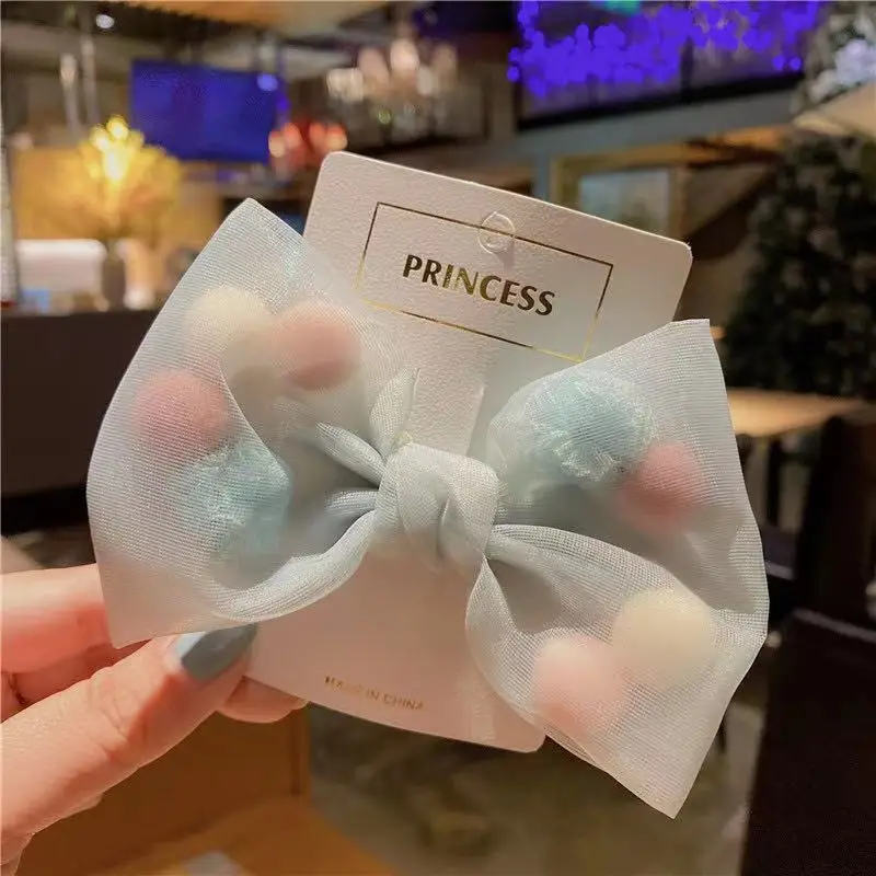 

Hot Selling Korean Version Of New Women's Fashion Bow Hairpin Color Lovely Wool Ball Net Yarn Top Clip Kids' Fashion Hairpin