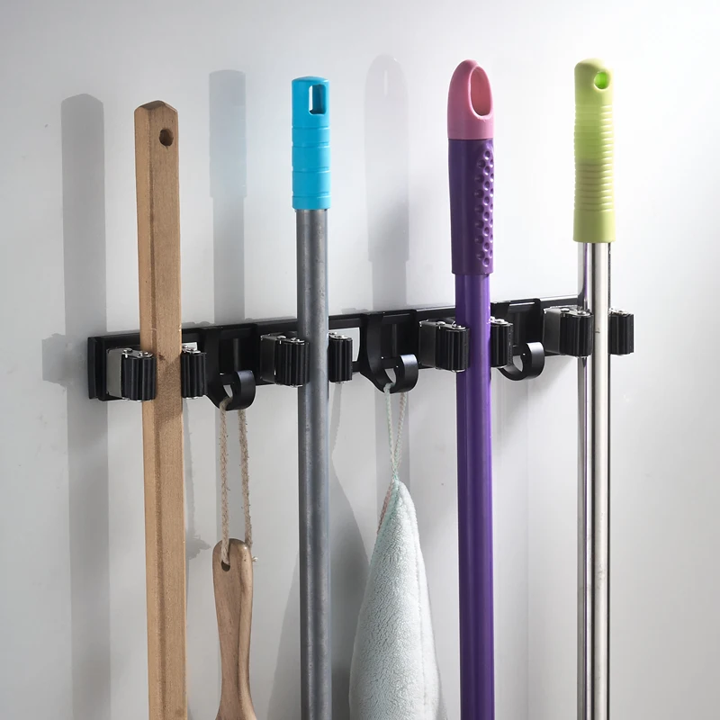 Черный настенный органайзер для швабры с винтами | Обустройство дома