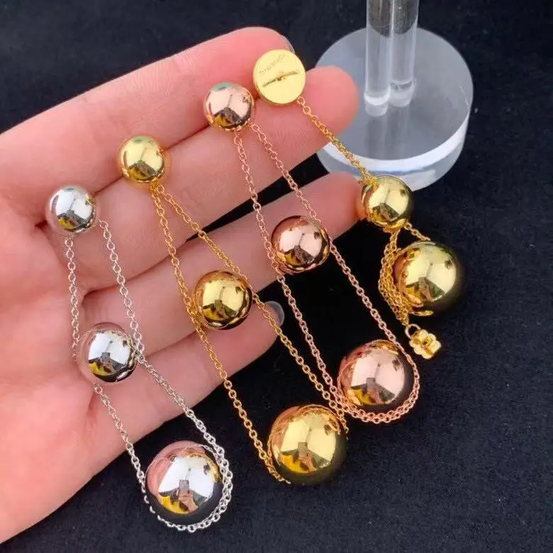 

European and American Golden Ball Long Fringe Earrings Glossy Ball Three-Ball Chain Stud Earrings
