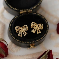 2022 hollow bow retro french niche design sense ear stud earrings for women korean fashion jewelry design personalized earrings