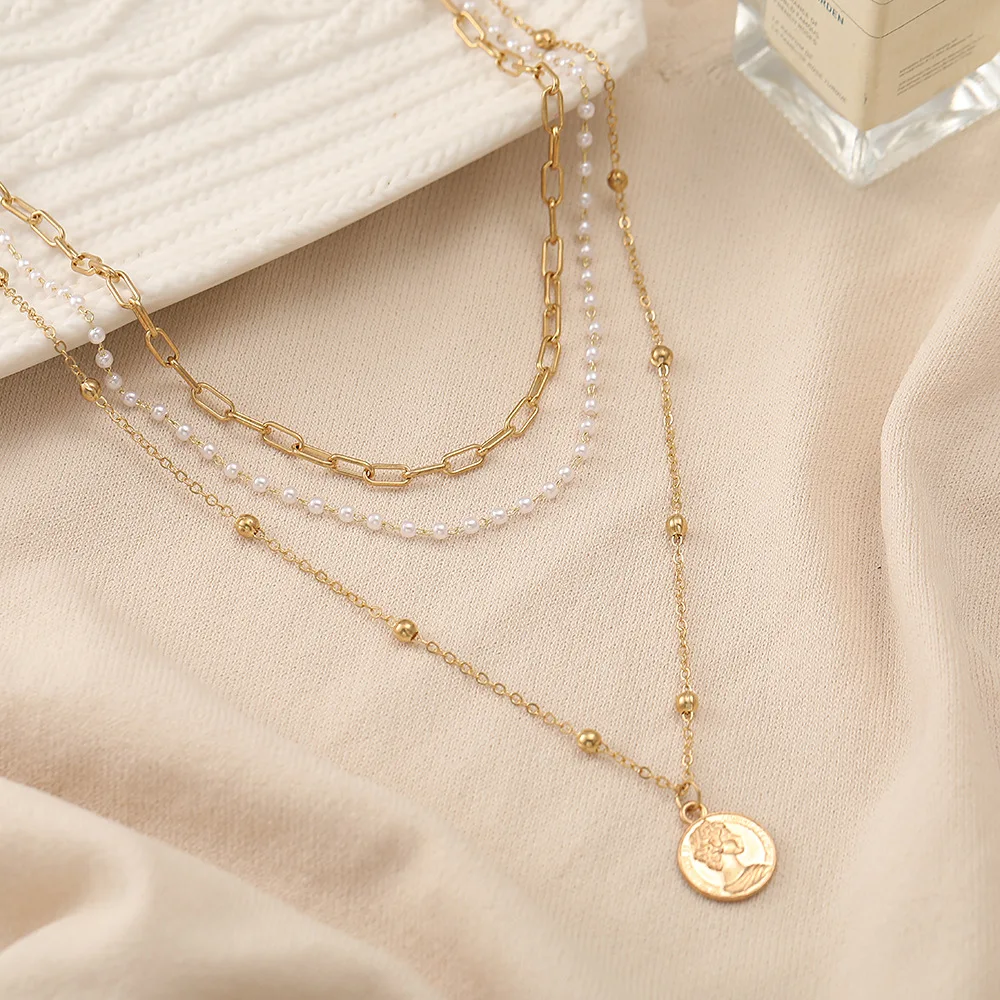 

2022 New Creative Simple Temperament Women's Portrait Coin Multi-layer Necklace Pearl Butterfly Pendant Three-layer Neck