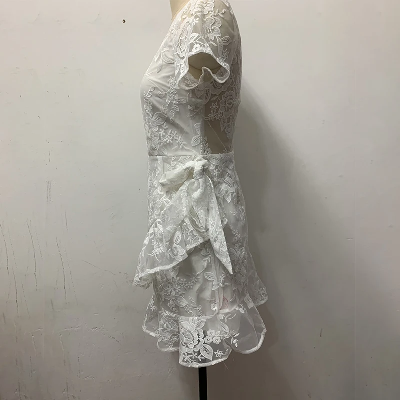

Women Sexy Lace Mesh See Through Mini Dress 2021 Summer V-neck Short Sleeve Irregular White Bodycon Ruffles Backless Party Dress