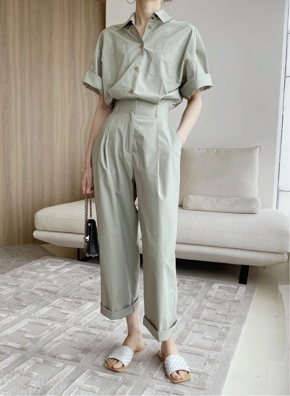 

The new spring and summer 2021 paste bag waist reducing overalls jumpsuit temperament high waist show thin leisure suit