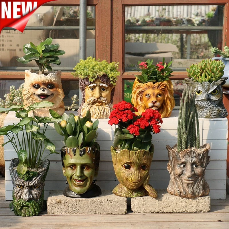 Зеленый цветочный горшок с человеческой головой больше мясных деревьев людей