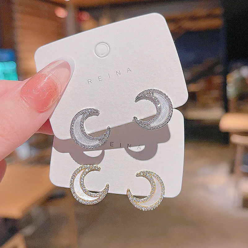 

Серьги-гвоздики с цирконом в виде Луны