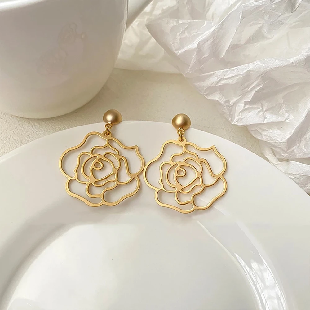 

Ghidbk Exquisite Hollow Gold Color Rose Flower Stud Earrings For Women Retro Ladies Matte Floral Ear Studs Earrings Jewelry Gift