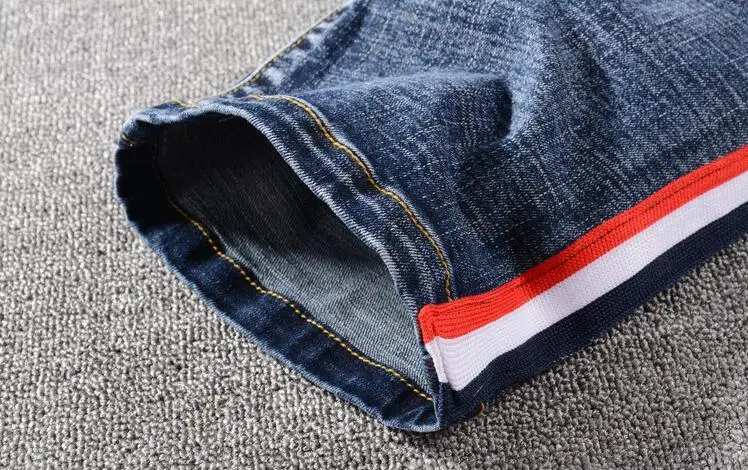 

New men's male trousers European autumn new style youth edging slim-fit jeans mens folds riding motorcycle denim pants