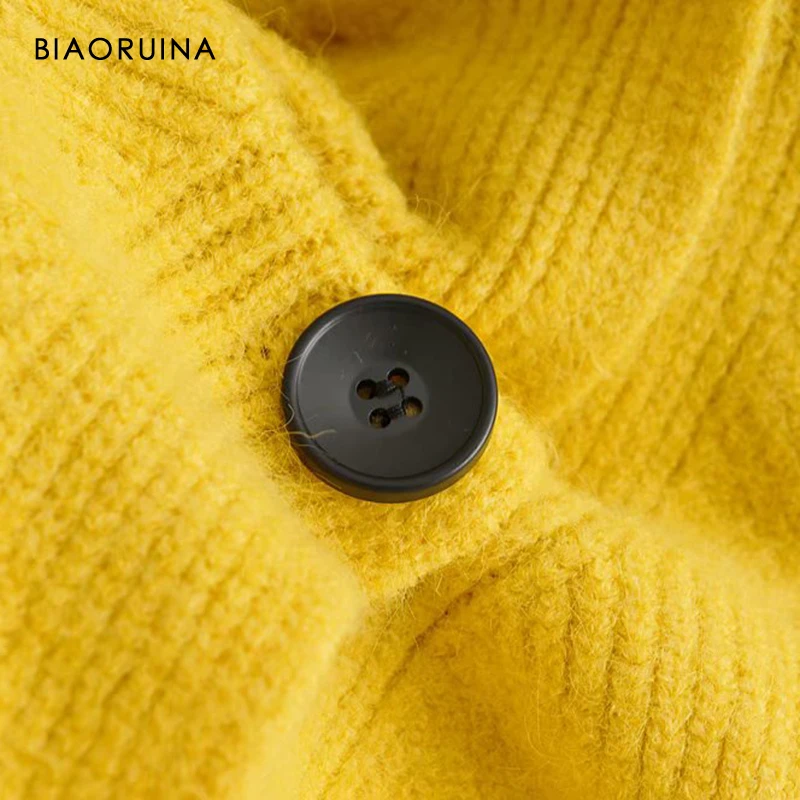 BIAORUINA 4 цвета Для женщин корейский стиль с v-образным вырезом открытые жаккардовые Однобортный свободные вязаные кофточки с рисунком в виде тянущийся свитер