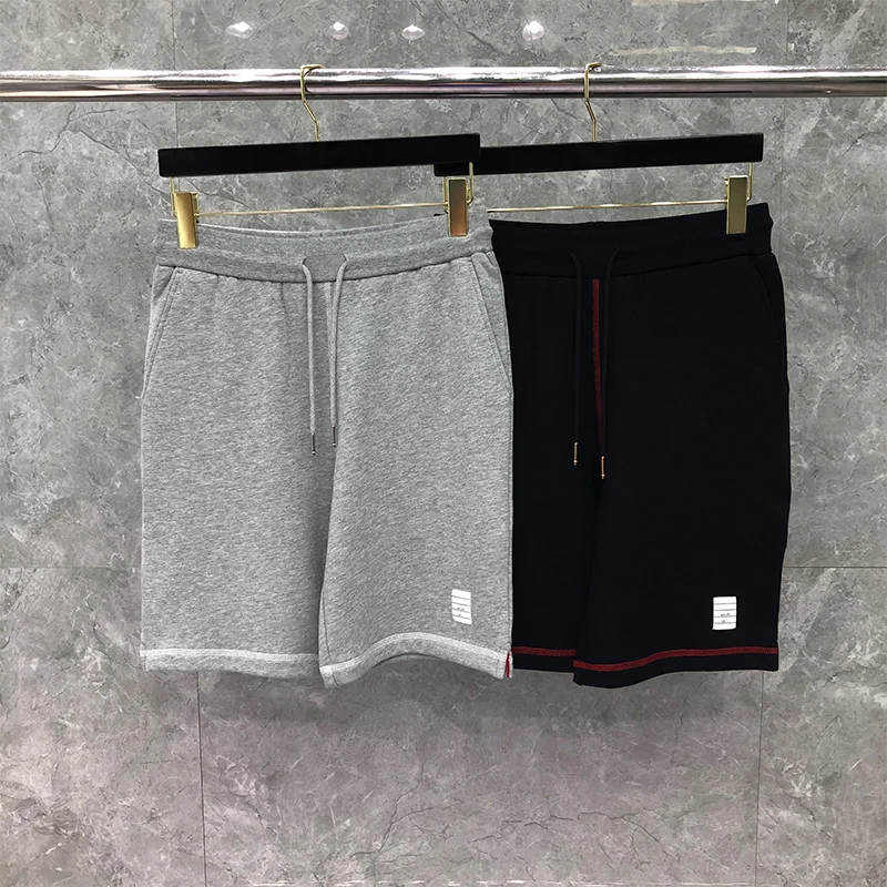 

Спортивные шорты THOM TB, повседневные модные брендовые штаны на заказ, оптовая продажа, однотонные пляжные шорты до колен для бега