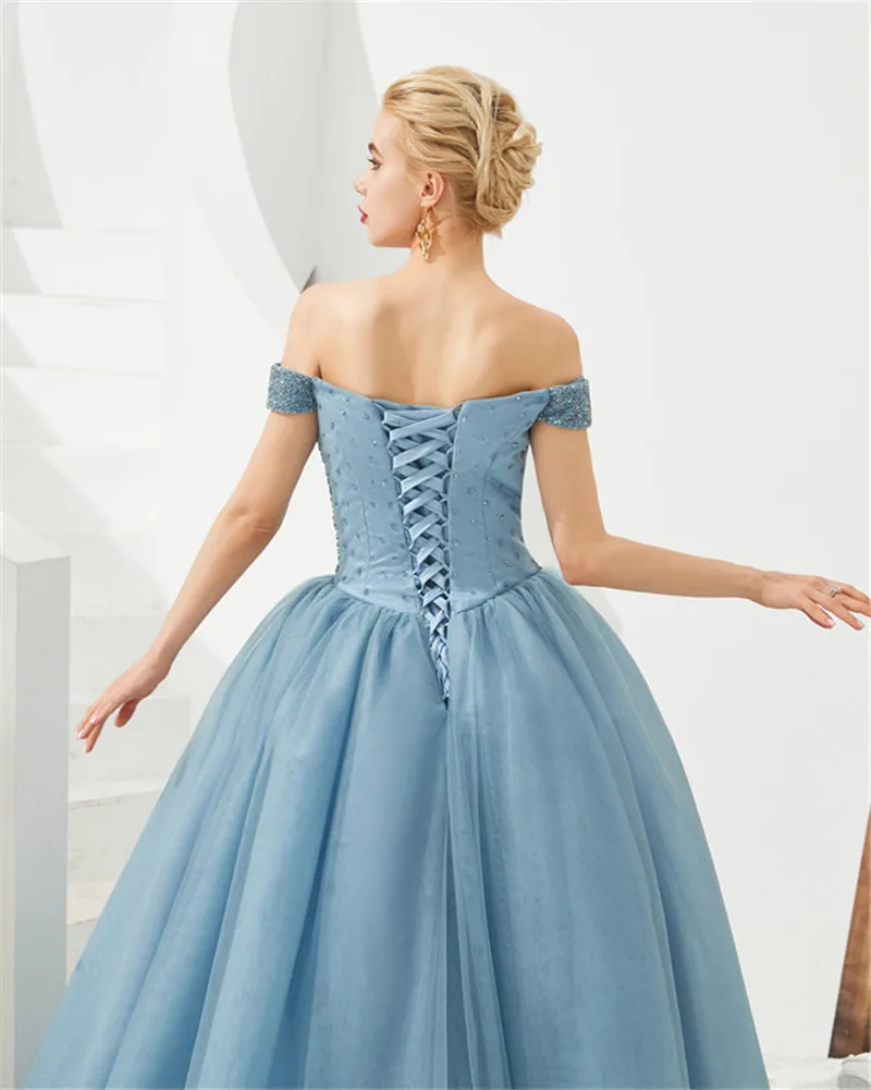 

Sexy Lace Up Back Ball Gown Light Blue Evening Dress Robe de Soiree Luxury Beaded Cap Spleeve Evening Party Dresses
