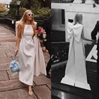 Свадебное платье-трапеция, с большим бантом, без рукавов, с круглым вырезом