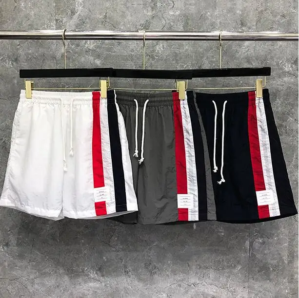

TB THOM BULUO Fashion Brand Casual Shorts Men Summer Beach Shorts Sports Trousers Vertical Striped Panelled Jogger Track Shorts