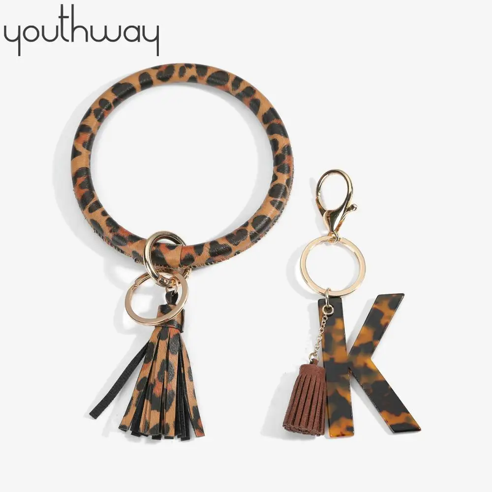 2 шт. набор брелок браслет из искусственной кожи круглый с кисточками леопардовым