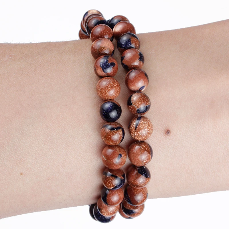 Бусины из натурального камня красные темно-синие мелкого песка для