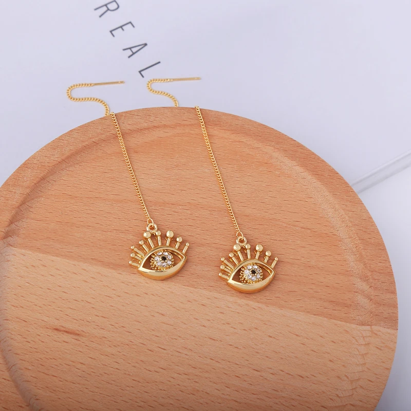 Женские серьги золотого цвета с длинной тонкой цепочкой уникальные кристаллами