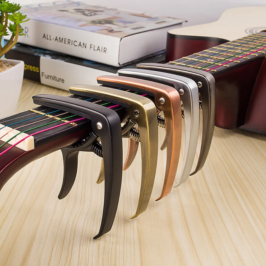 

Zinc Alloy Guitar Capo Is A Capo Ballad Guitar Ukulele Gold Pullable String Nail Musical Instrument Accessories Parts