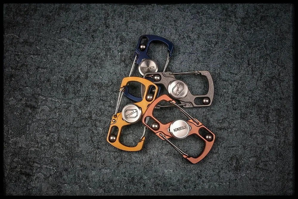 Цвета мокрого камня Титан четыре Цвет дополнительный фиджет-Спиннер для пальца