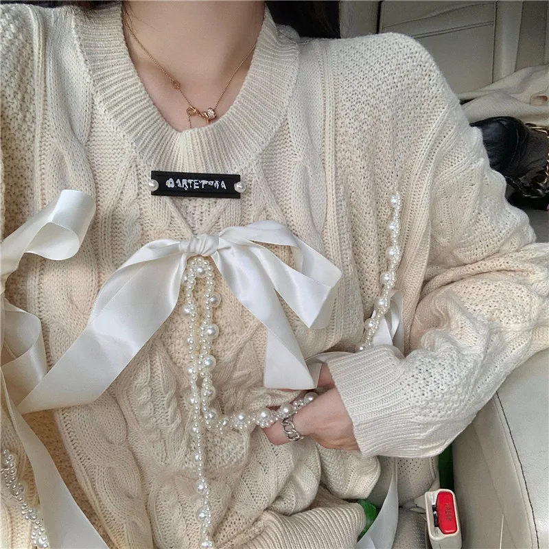 

Autumn Winter Sweet Korean Loose Pearls Chain Bow Hole Knitted Pullover Women Elegant Chic O-Neck Sweater Girls Tops Outerwear