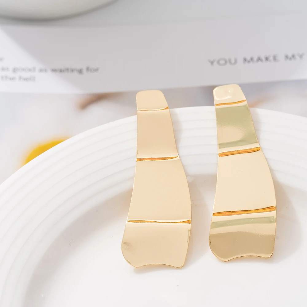 

Stainless Steel statement metal gold geometric stud earrings