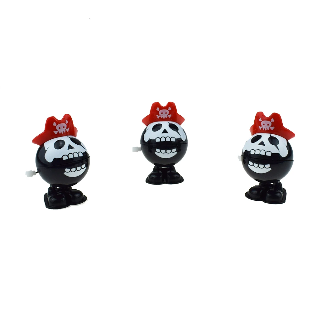 

20pcs/lot New Clockwork Jumping Pirates Skull Wind Up Bounce Toy Props Toy Party Halloween Gift