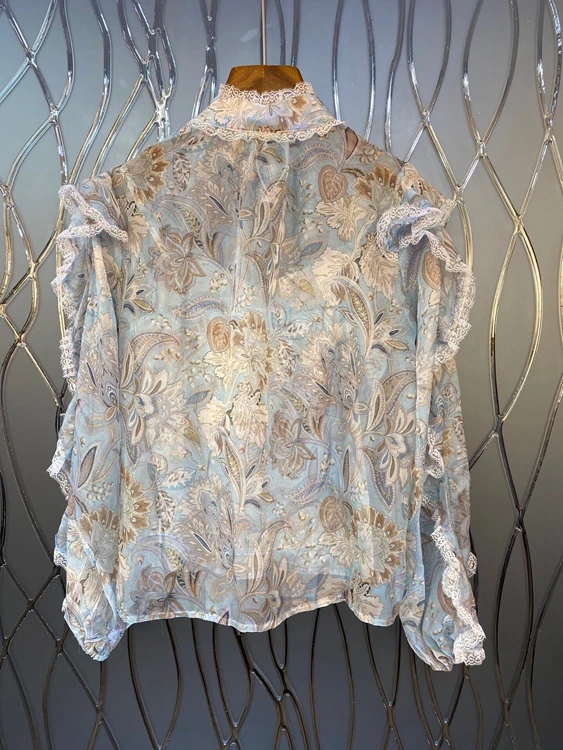 

2021 spring and summer new women's round neck sleeve fungus lace stitching perspective printing fashion long sleeve top 319